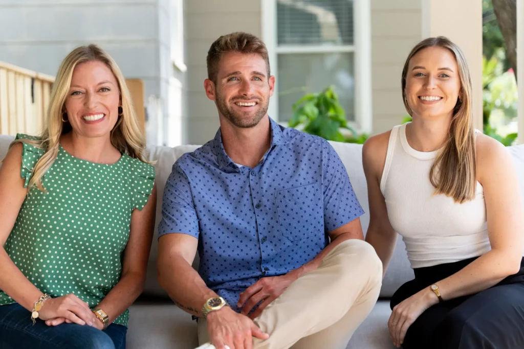 Team photo day: three colleagues photographed together on location