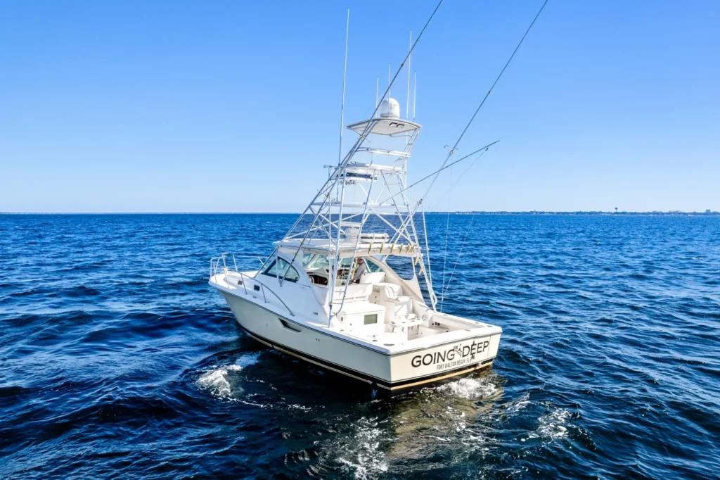 Sportfishing Tournament Video 3 Sportfishing yacht photographed from above and ahead, cockpit and flybridge visible across deep blue water