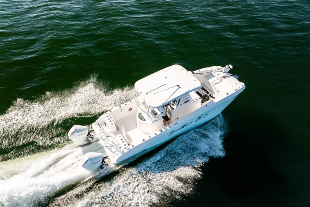 Twin Vee power catamaran banking through a turn, seen from directly above
