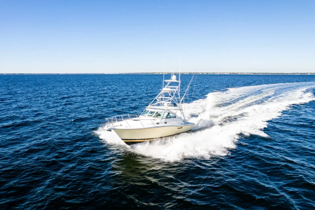 Sportfishing Tournament Video 2 Sportfishing yacht at full speed across deep blue Gulf water, spray off both bows